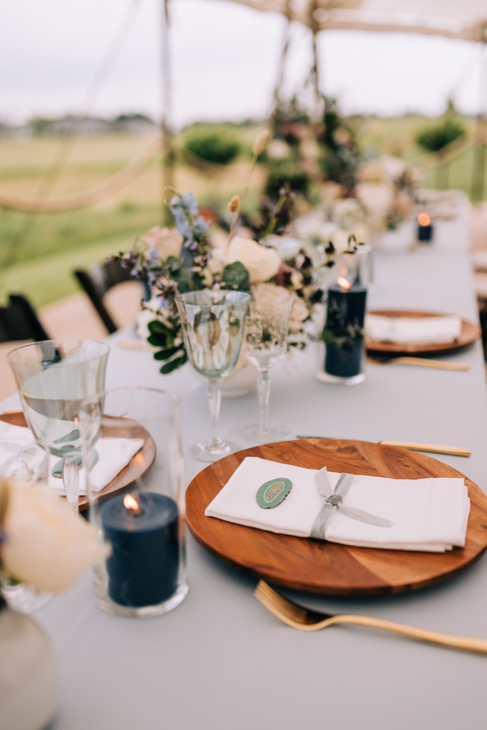 With a love for travel and adventure, Julie & Alex's Mountain-esque Tented Wedding was centered around natural blue and green tones...