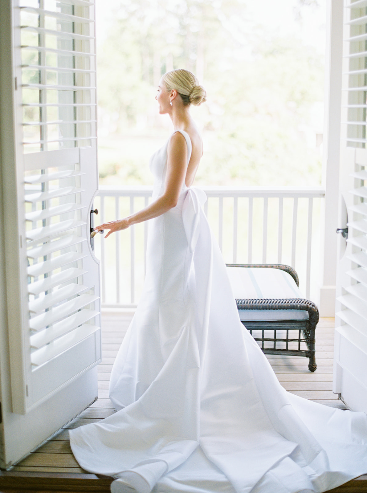 Autumn & Philip's Southern Vogue Wedding. Donning an impeccably tailored gown by Sareh Nouri, Autumn was the picture of grace in the gorgeous "Ren," complete with a statement bow, and the perfect "90's Vogue-inspired" hair and makeup.